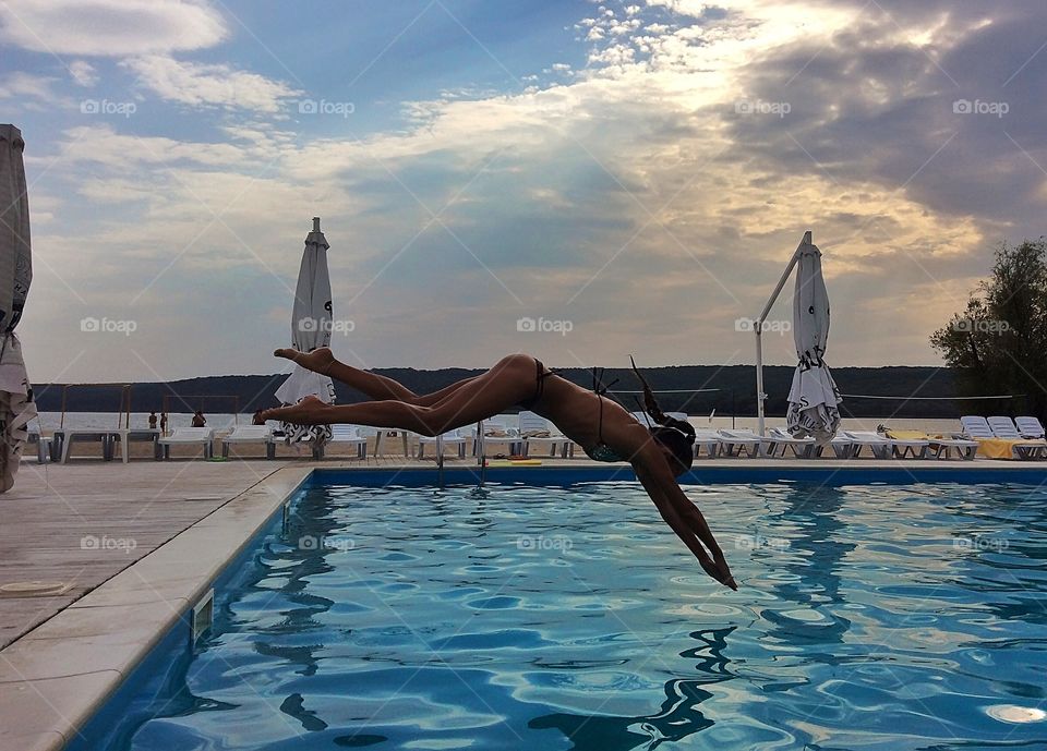 Summer vacation at swimming pool 