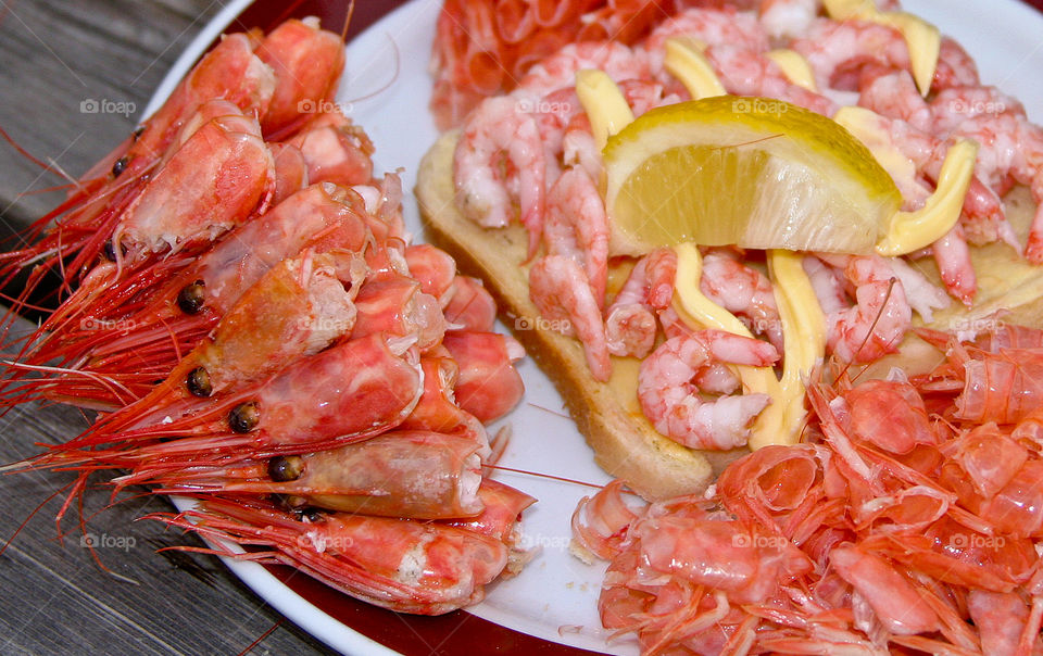 Shrimp sandwich. Shrimp sandwich with mayonaise and slice of lemon. 