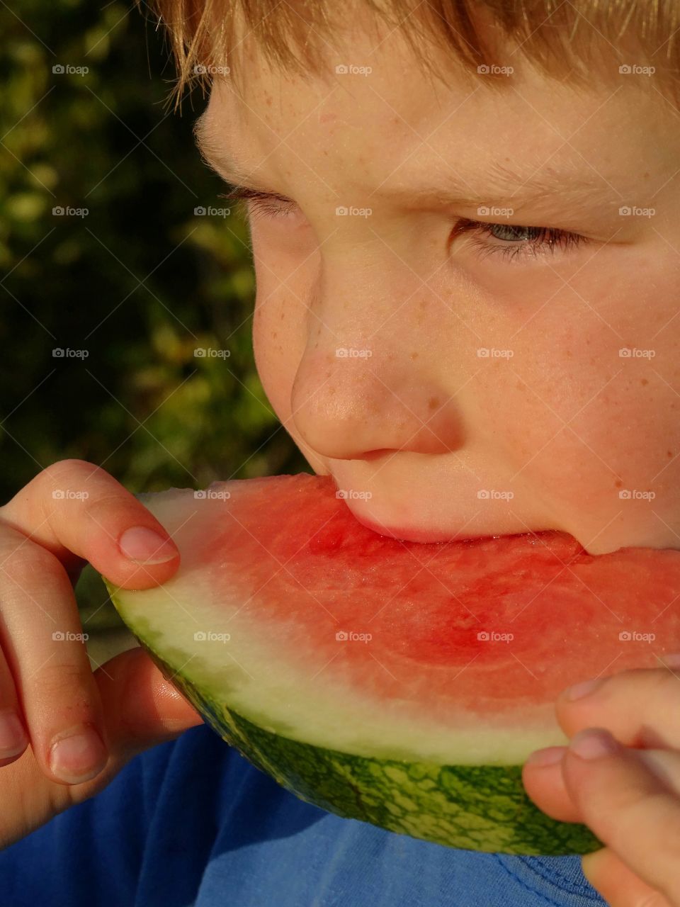 Boy Eating Watermelon Slice