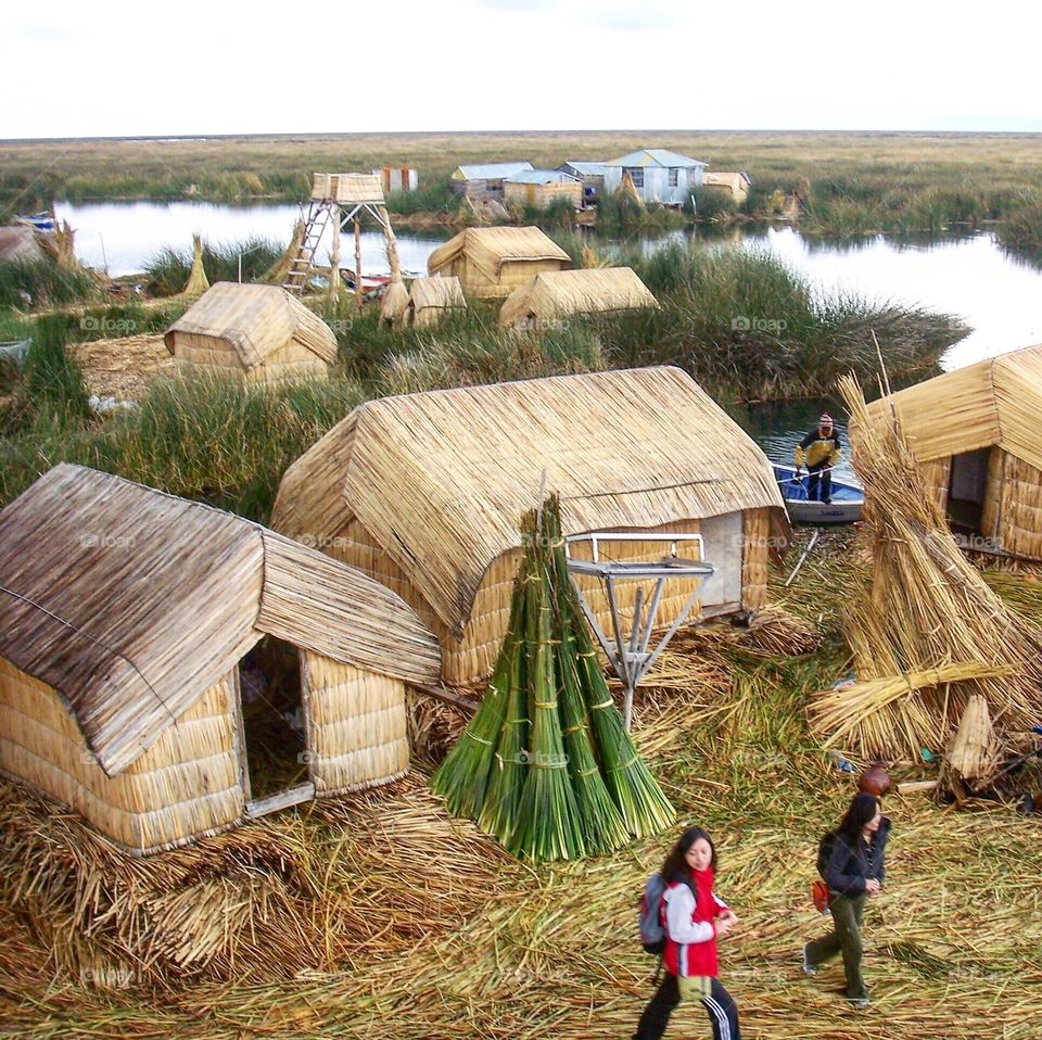 Houses on floating islands in Lake Titicaca