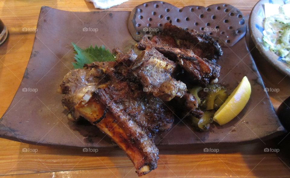 Okinawan Soki, Pork Spare Ribs on a Traditional Japanese Squared Plate.  Tokyo Station, Japan