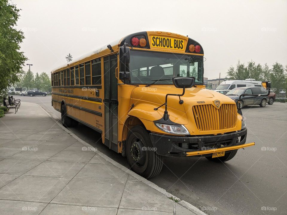 schoolbus parked to pick up youngsters