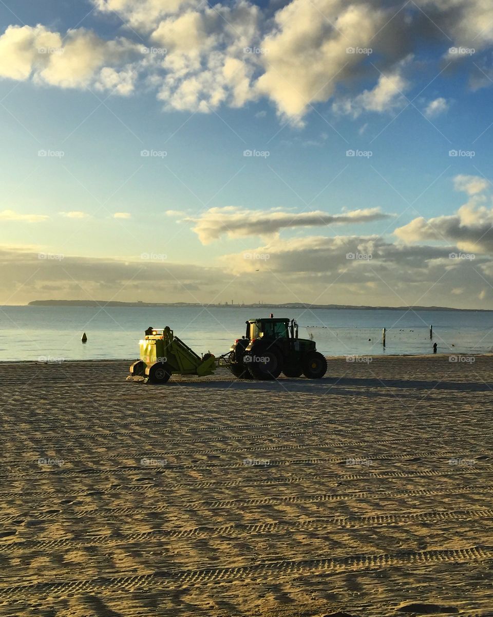 Work at the beach, tractor.