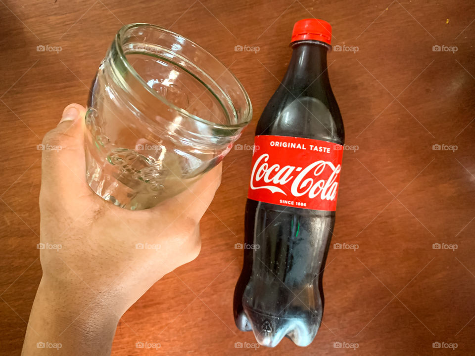 A jar of Coca-Cola at your dinning table 