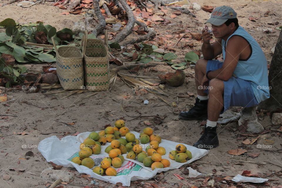 Fruits vendor selling mangoes,Guantanamo,Cuba