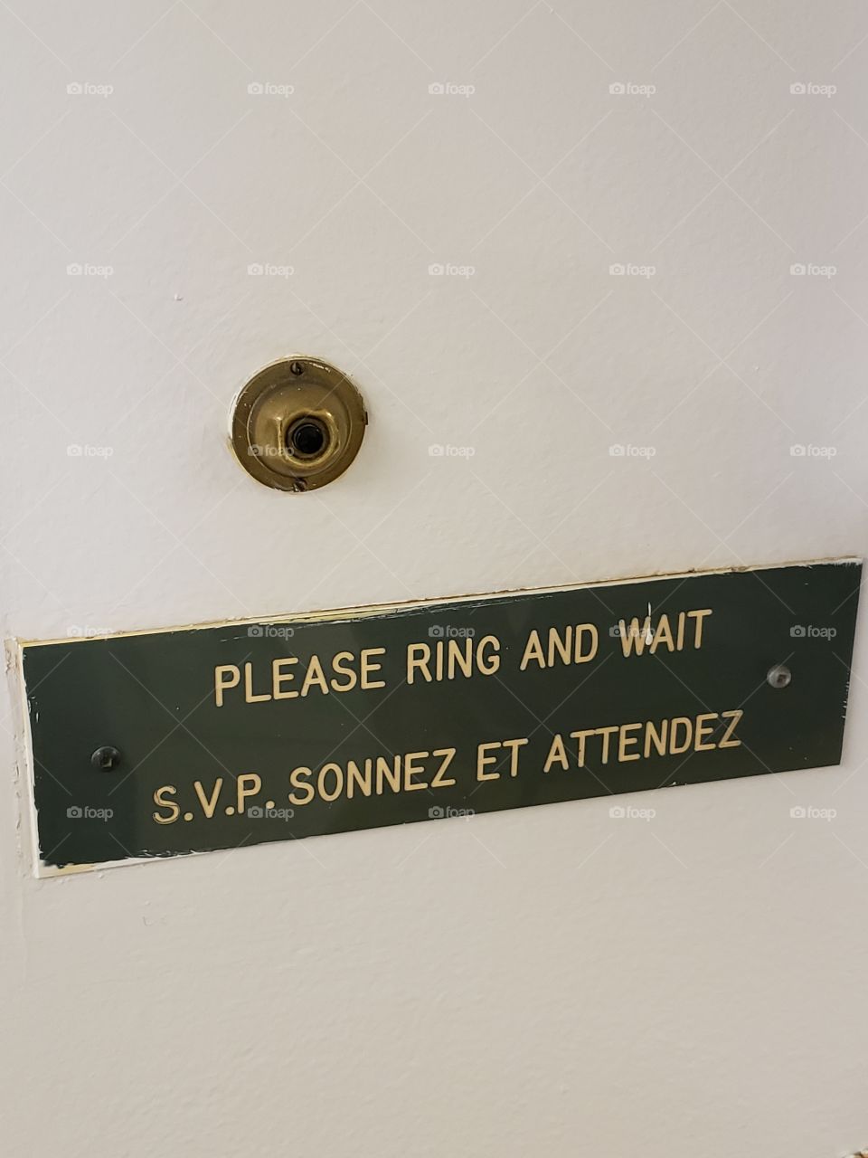 Vintage doorbell and sign
