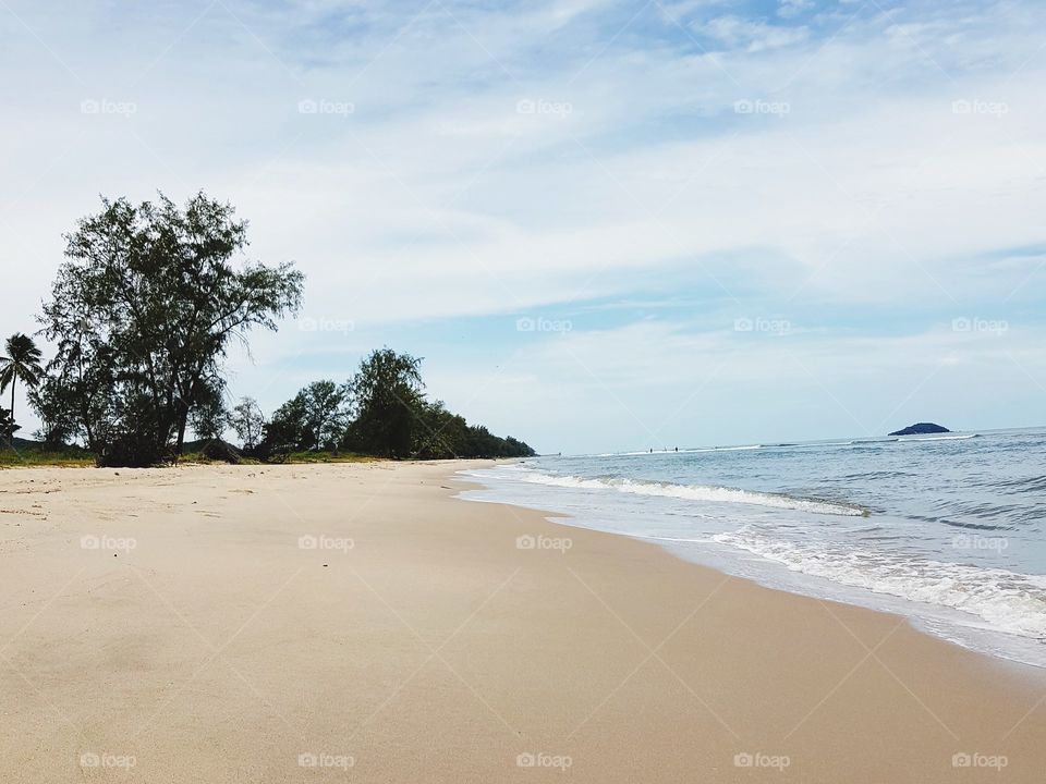 Scenic view of beach against sky