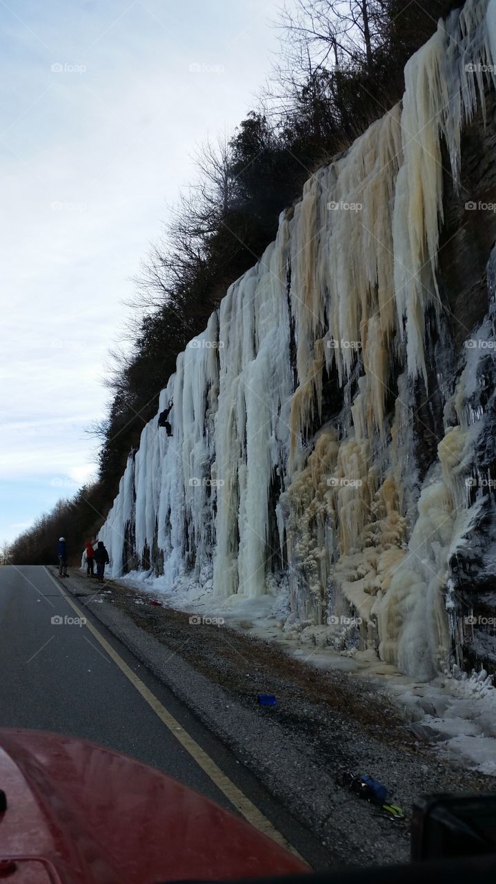 wall of ice. ice climbers