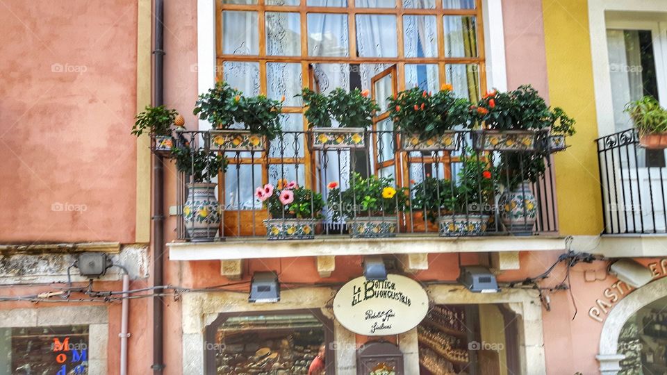 Balcony with flower pots, Taormina Sicily