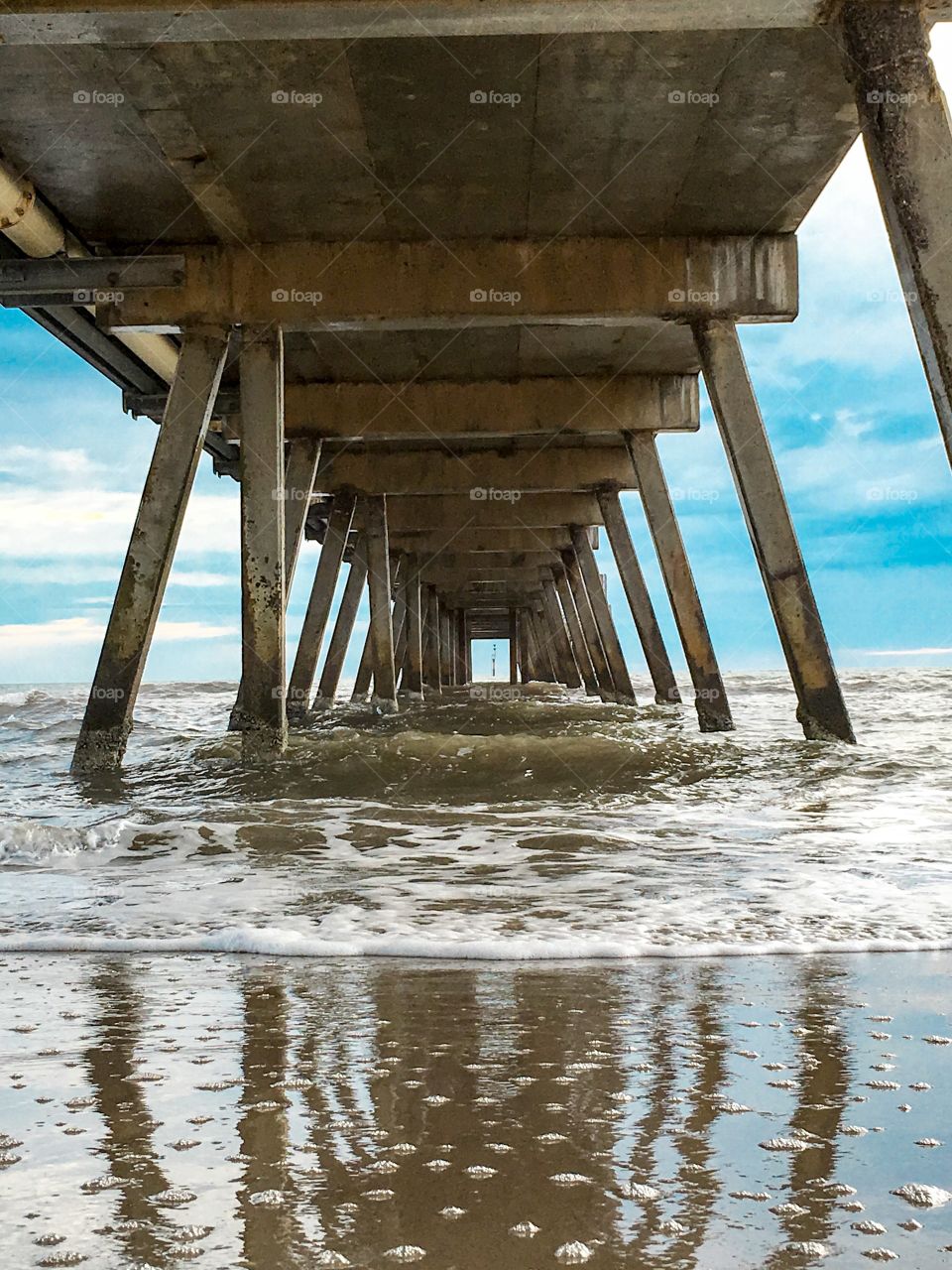 Jetty pier wharf dock from underneath perspective 