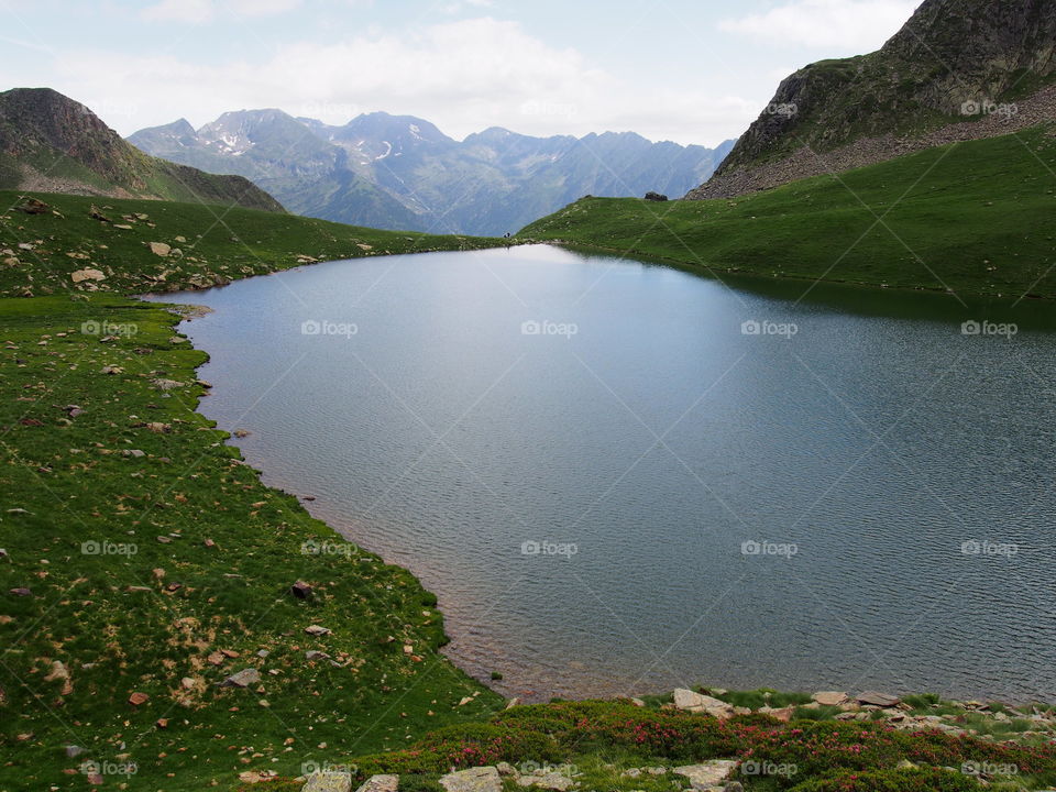 Scenic view of lake by mountain