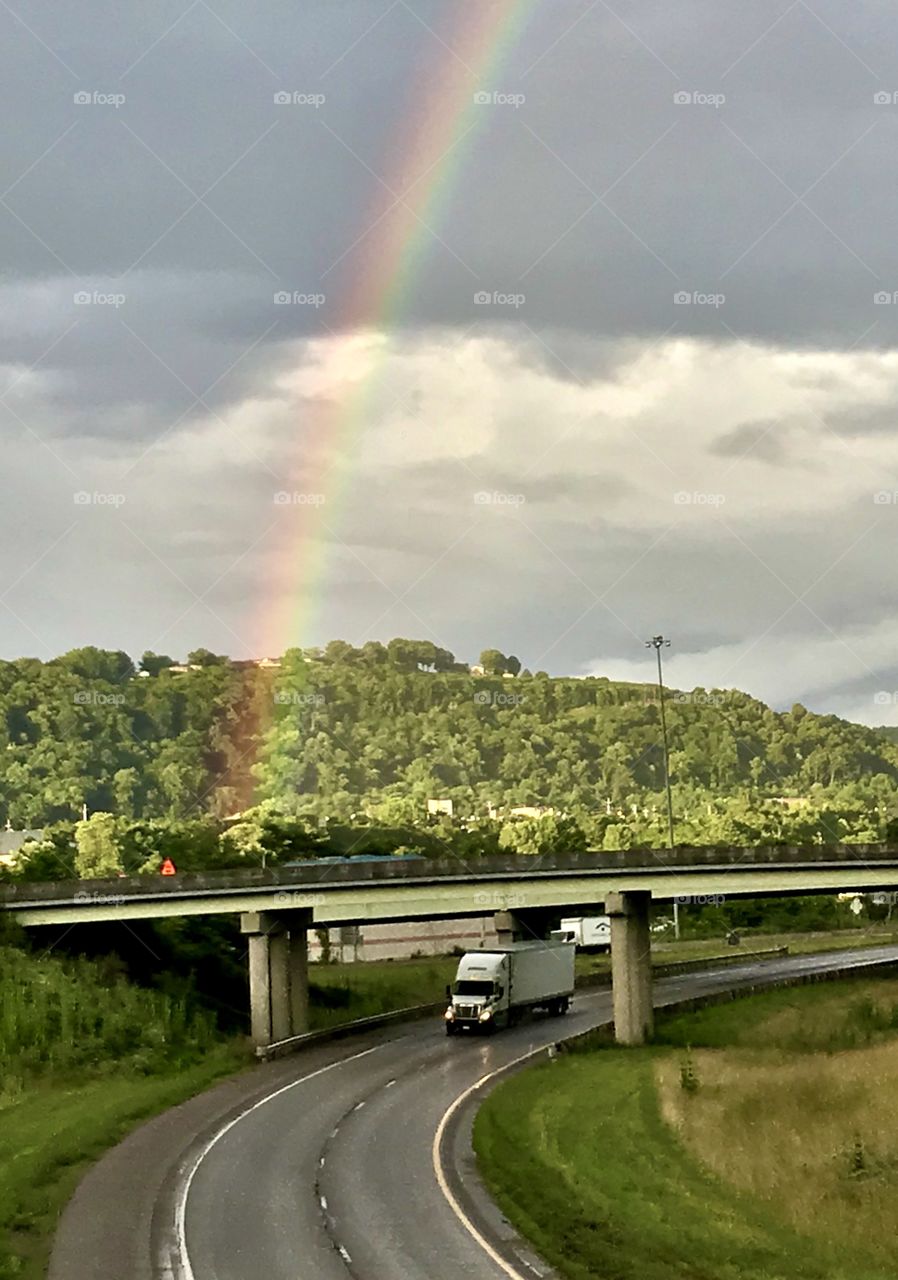 Highway with a rainbow over it