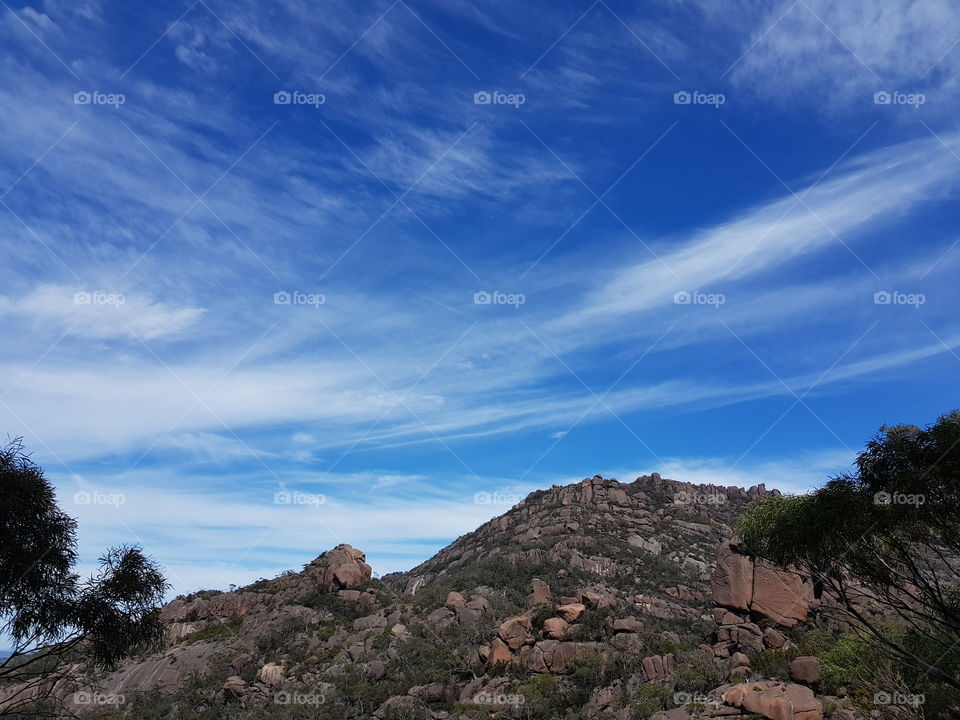 Blue sky over a hill