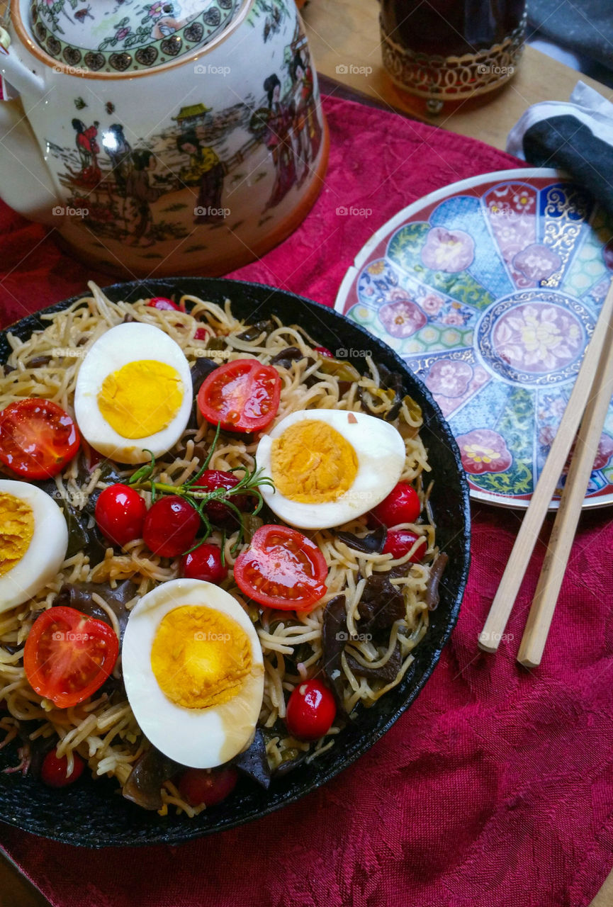 Noodles, eggs, soy sauce, tomatoes