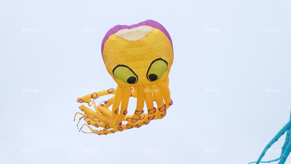 One yellow octopus kite
