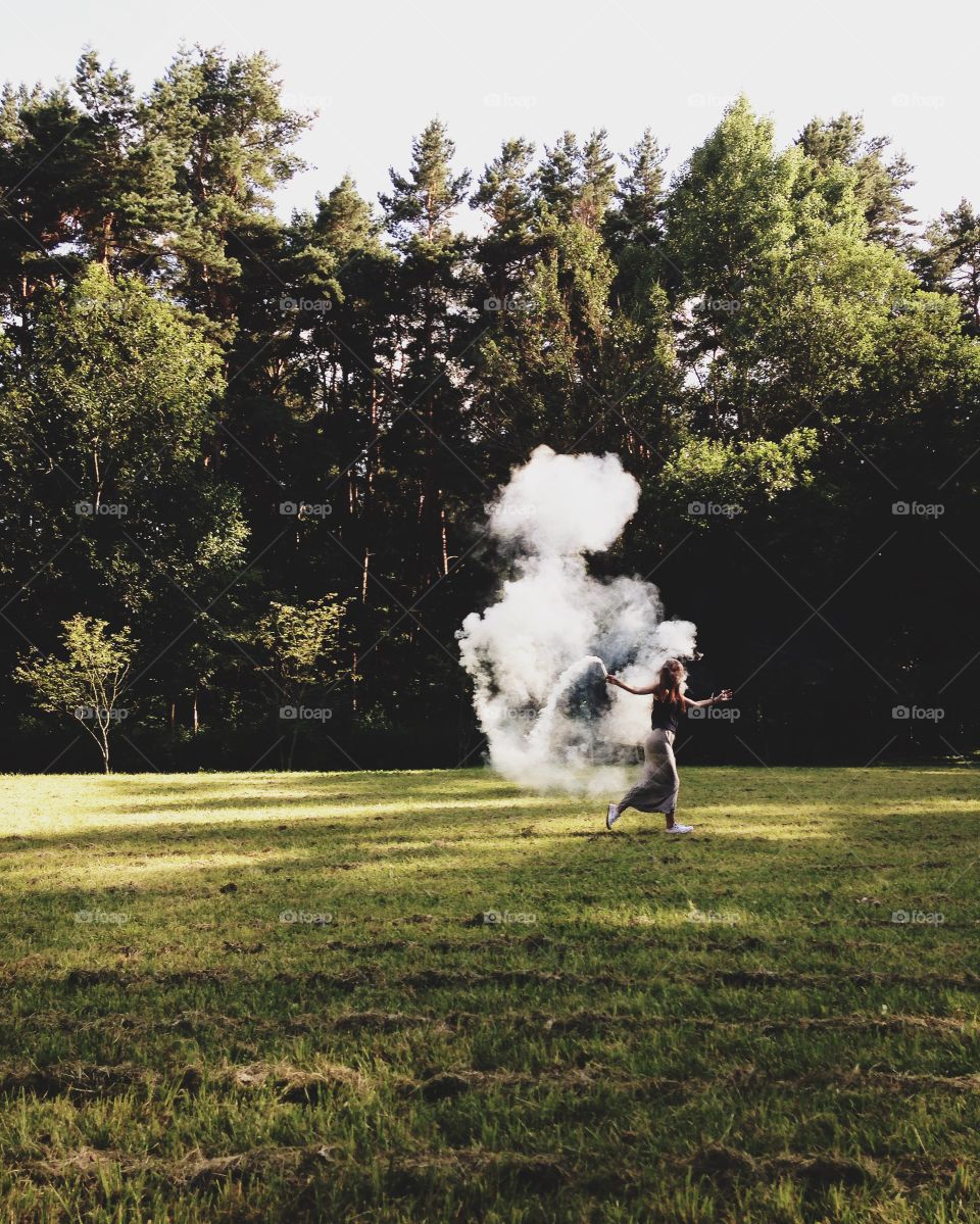 Girl with smoke bomb