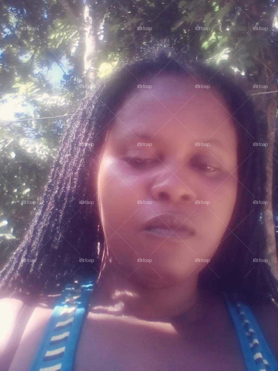 real Black beautiful lady how love life and will always go in to her thoughts an fine the answer to her problem.