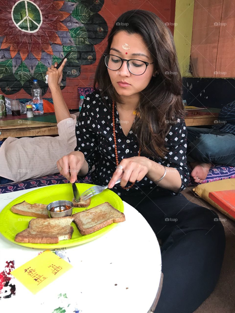 spiritual meal ,
This image at varanasi 
assi ghat 
Hunger 
honey bread 
vermillion on head 
focus to food
zara outfit 
ray ban glasses
