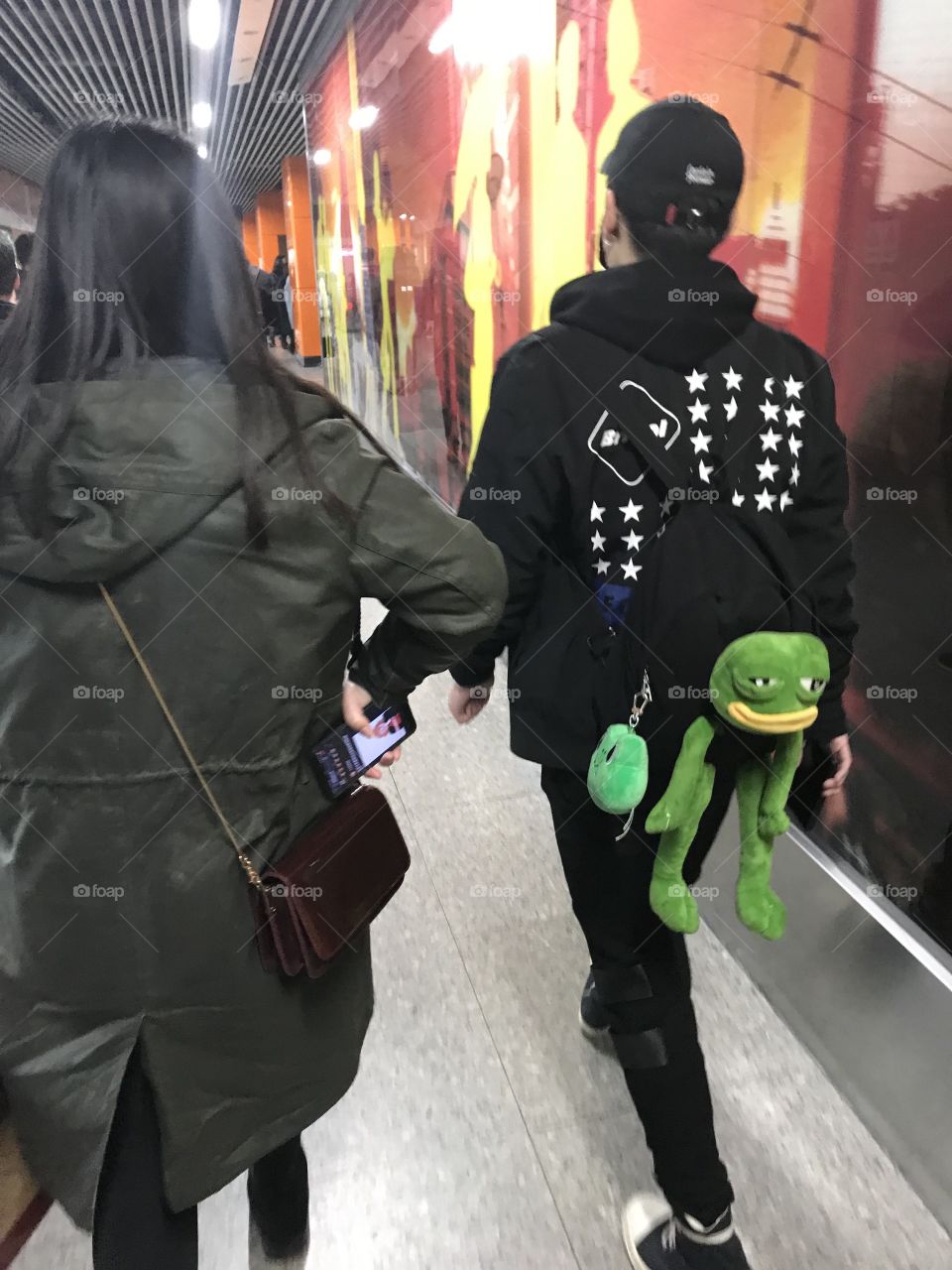 Shanghai style - of course every backpack should have a stuffed animal attached to it
