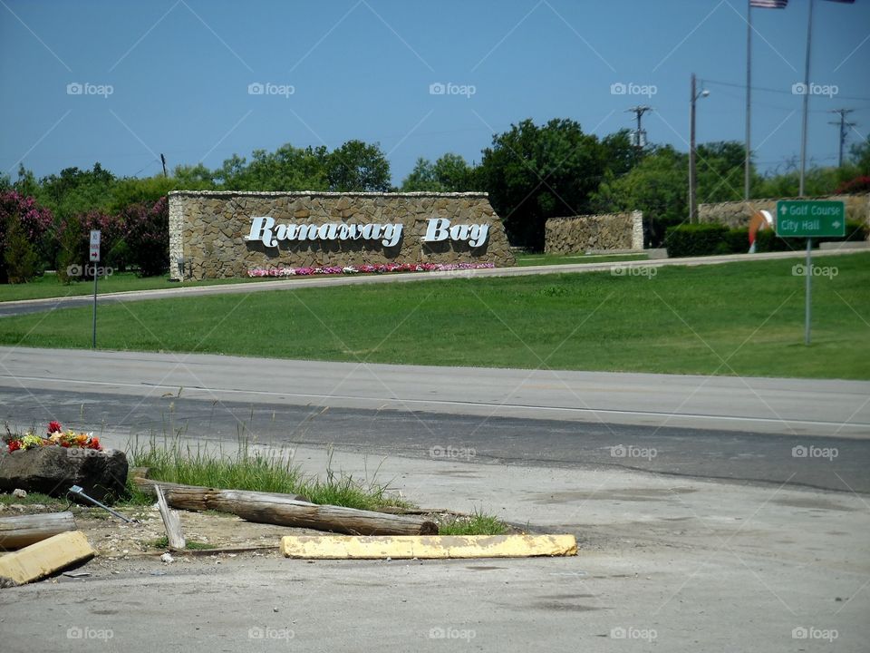 Runaway Bay. This is the welcome sign in front of the Runaway Bay office located near Bridgeport Texas