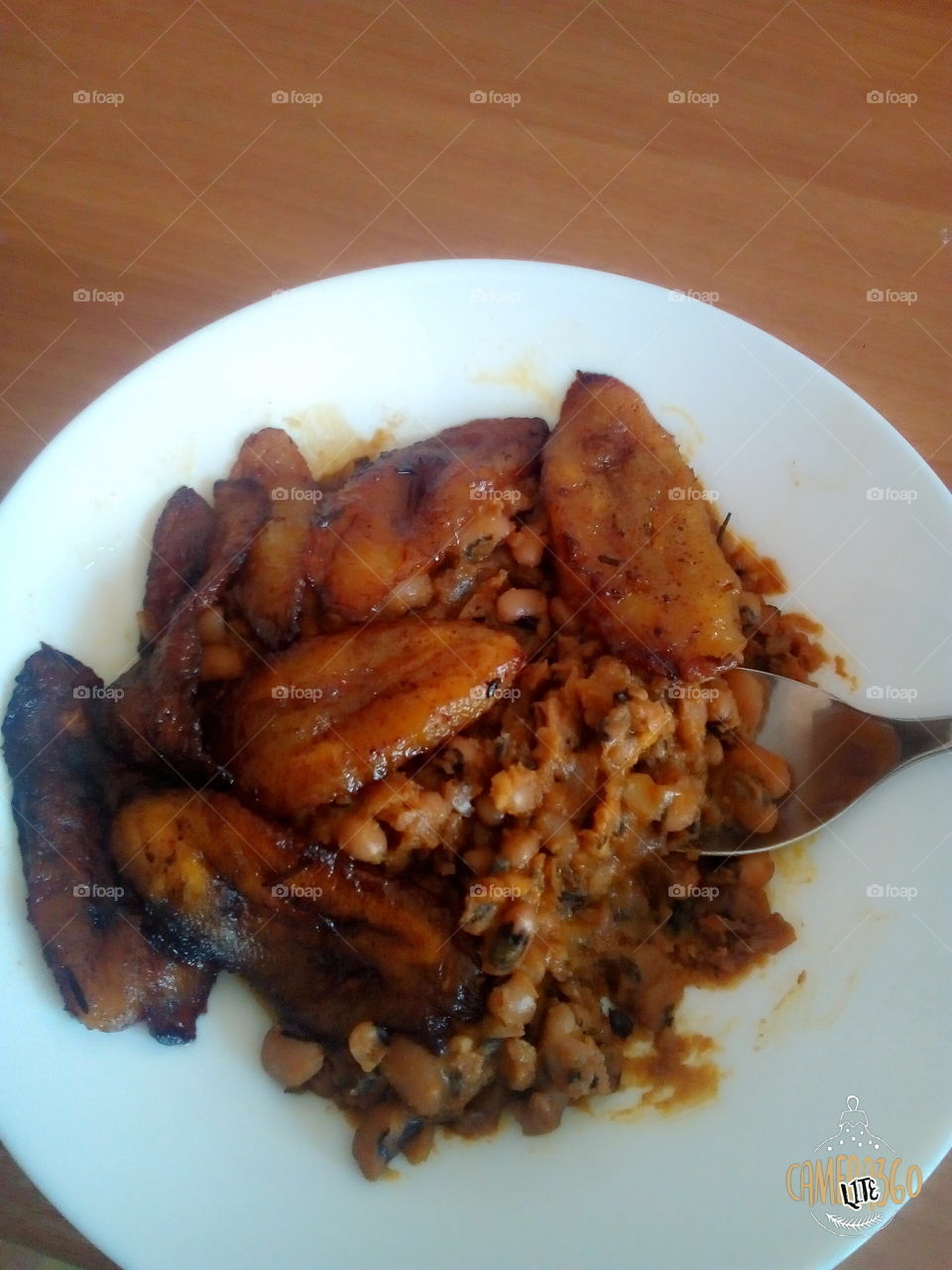 fried plantain with red oil beans