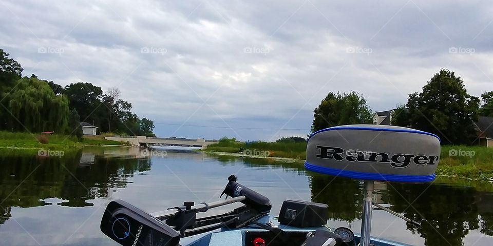 Fishing on a peaceful summer day in a 1986 Ranger Boat