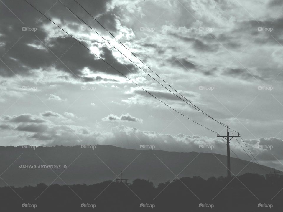 Contrast of nature, mountain, sky and clouds