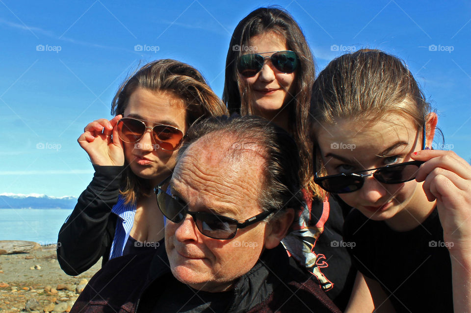 Nothing in this world makes me as happy as my family! This photo of my husband & our 3 beautiful daughters was taken at one of our favourite beaches on a sunny March afternoon! My not always cooperative lovelies are giving me smiles & sass! ❤️