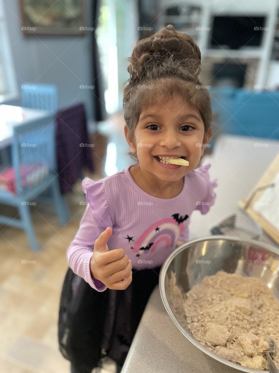 Little girl eats apples while baking with mommy, baking with mommy, little girl acts silly in the kitchen, baking from scratch 