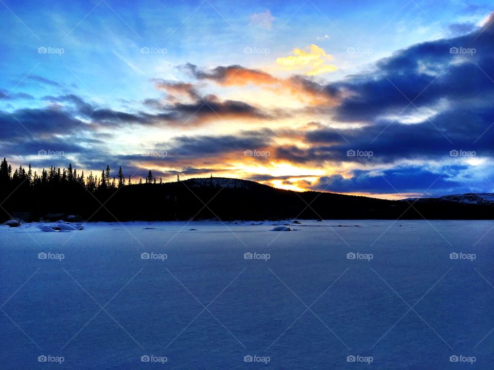 Sunset in snowy landscape 
