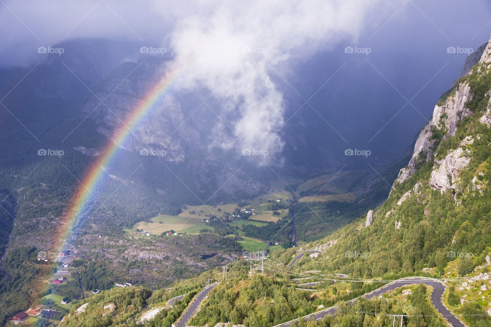 Double rainbow over a valley Lysebotn. Norway