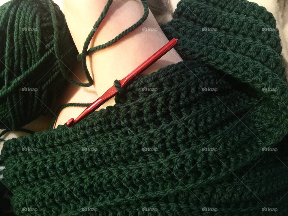 Crocheting with a deep green yarn