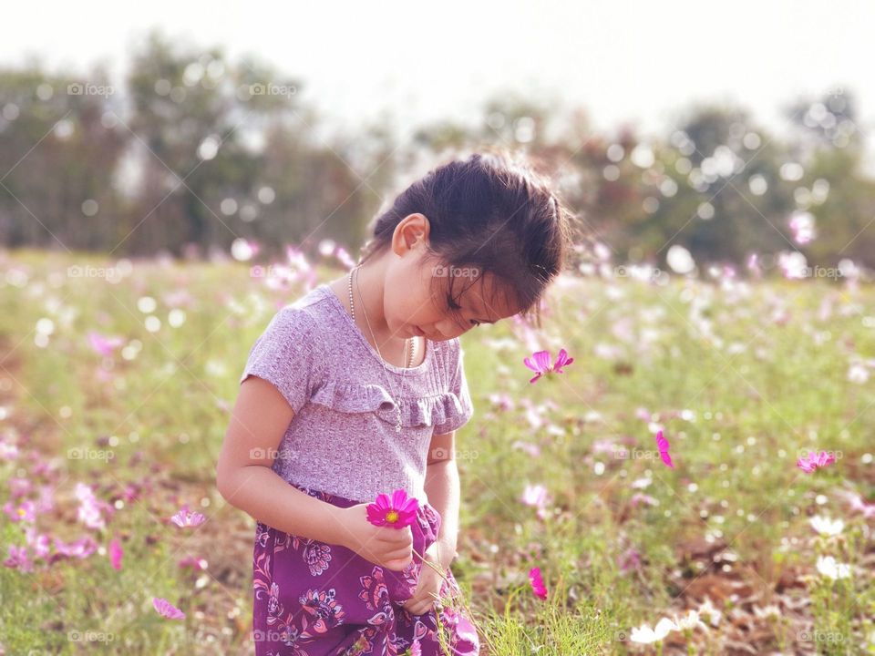 Girl and​ flower