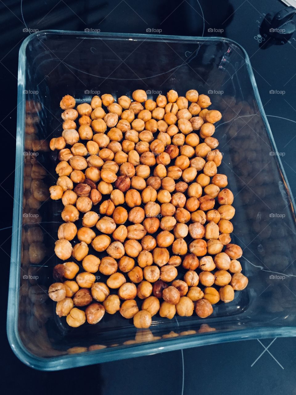 Roasted chickpeas in a glass bowl, homemade 