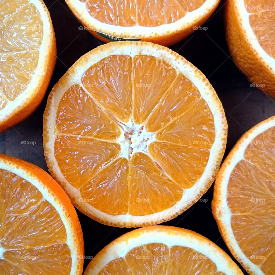 Cut oranges. several cut oranges