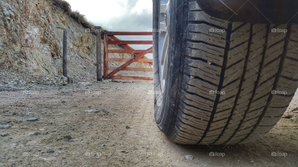 road on rural trail. vehicle under rural road