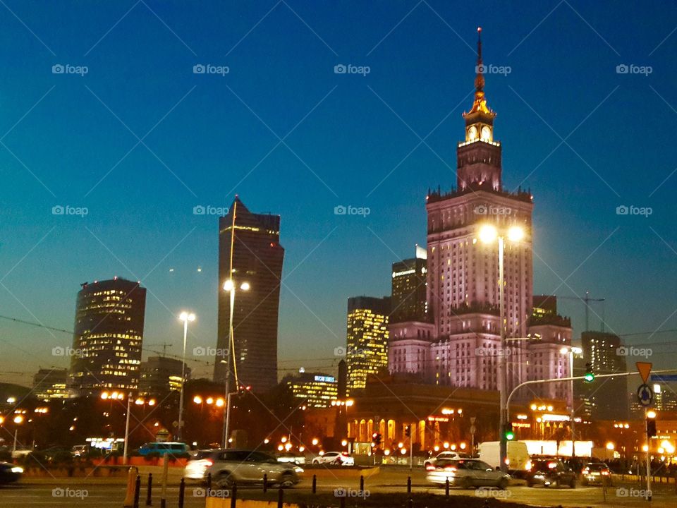 Warsaw, Poland night line. Evening cityscape of the downtown of Warsaw, Poland 