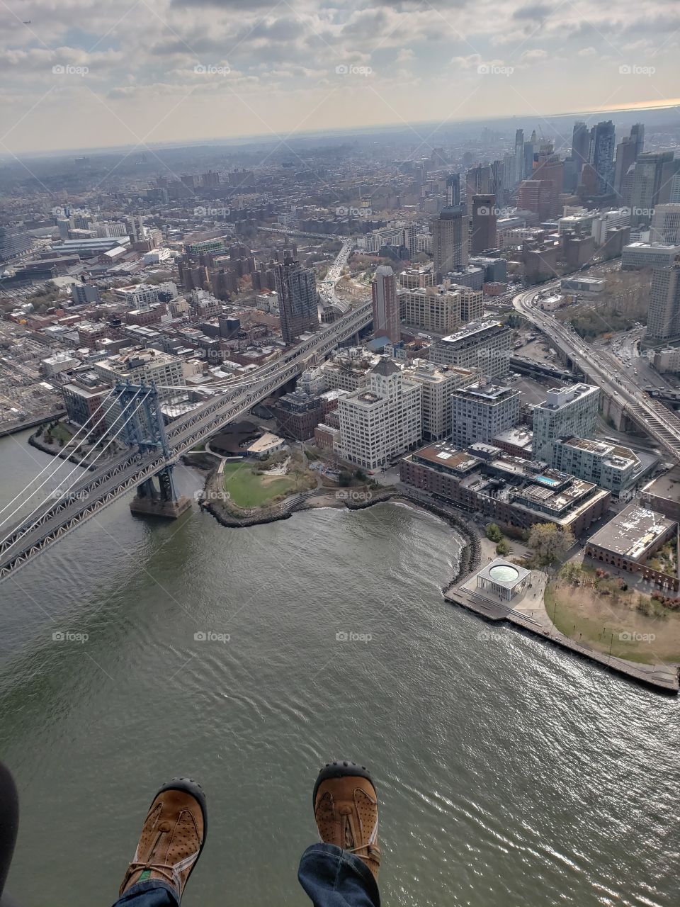 Feet sticking out of helicopter over NYC!