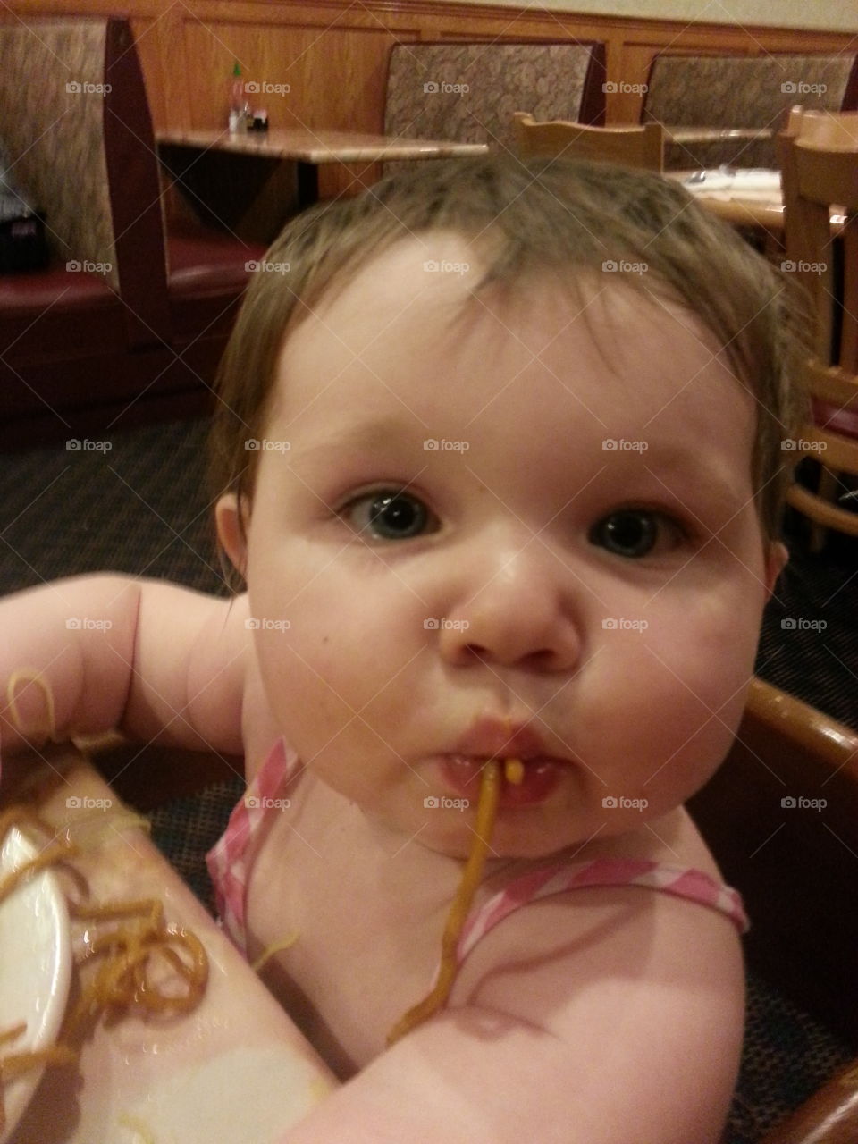 yummy noodles. Mia at her first buffet