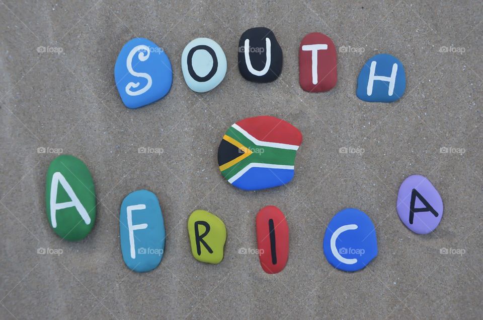 South Africa, souvenir on painted stones with national flag