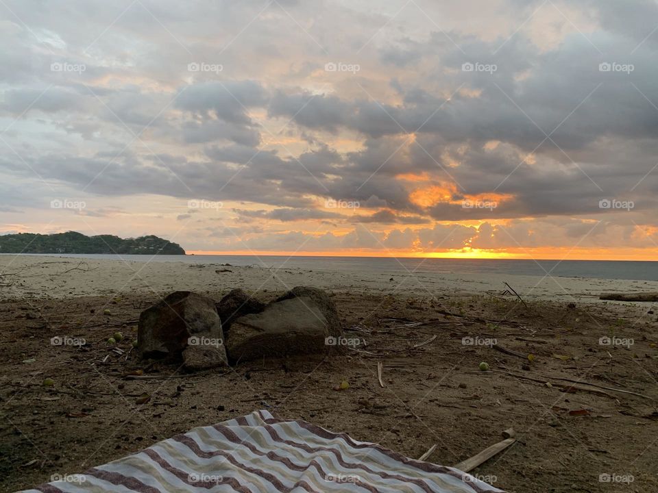 Atardecer desde la playa y picnic 