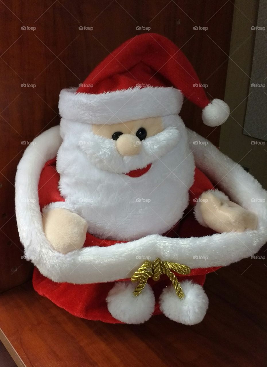 Plush Santa in a Toy Bag