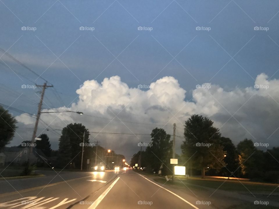 Clouds over cars