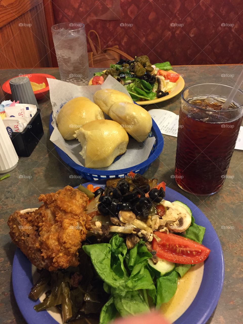 Delicious food on plates at a table. Colorful and healthy.