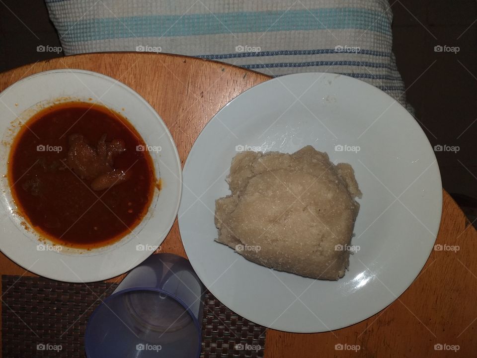 Nigerian Dish. Eba and Soup. Eba is made from dry Cassava