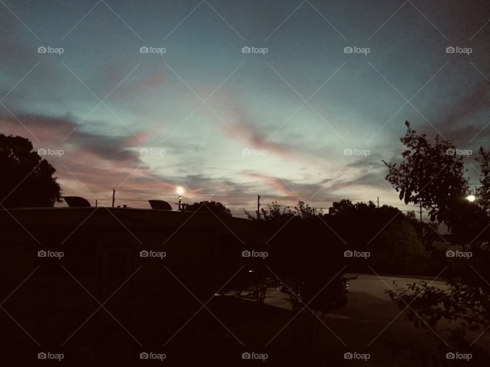 Good Early Morning Can You Here the Crack Of Dawn. Beautiful Green Hues Some Yellows turning to Pink Hues just making Sunrise More Special. 