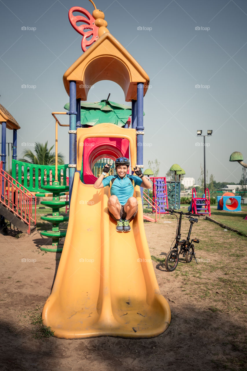 Man playing in the playground 