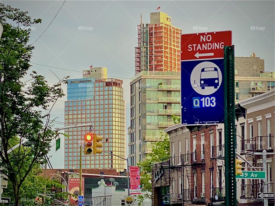 A multifaceted impression of the city from “Vernon Jackson Ave” in LIC, Queens near the “Pulaski Bridge” and “Newtown Creek”. At rush hour the cars roll on incessantly 2022. Hypnotic Productions