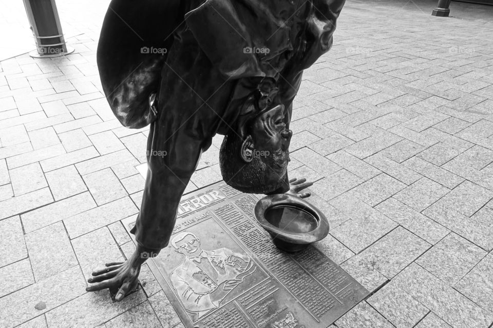 The sculpture of Percy Button, who was a well-known entertainer, is situated in Hay Street Mall, Perth, Western Australia.