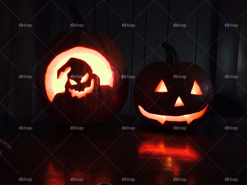 Carved pumpkins featuring Oogie Boogie from The Nightmare Before Christmas and a  more traditional "vampire"  carving.